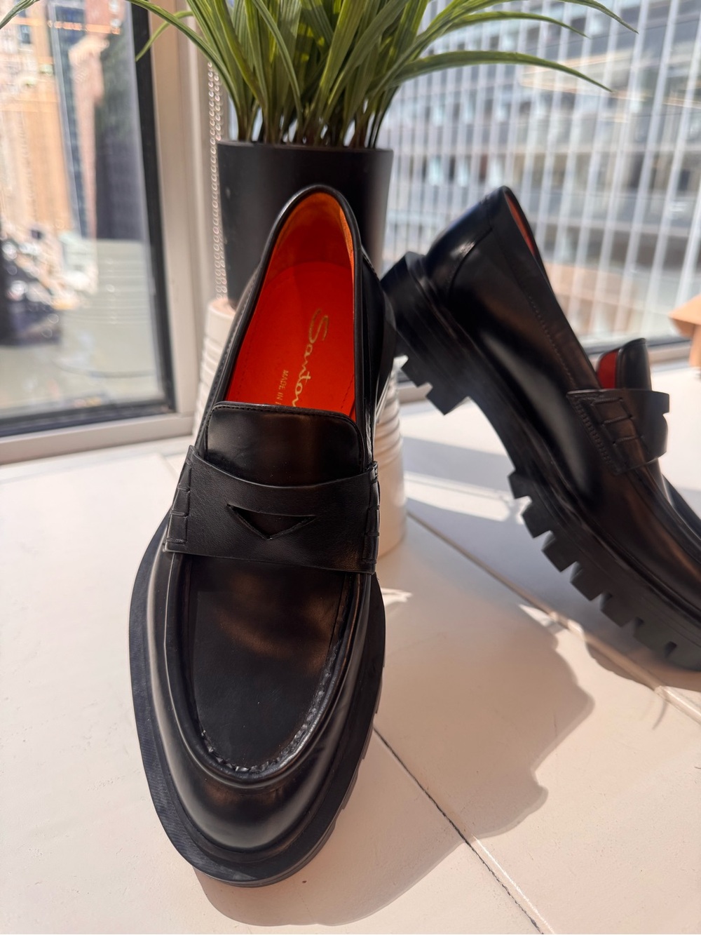 Santoni Black Leather Lug-Sole Penny Loafers with Red Insole